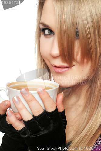 Image of Smiling lovely young blonde with a cup