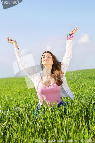 Image of Portrait of happy nice young woman