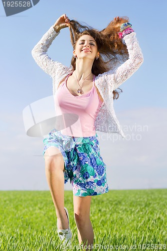 Image of Cheerful pretty young woman