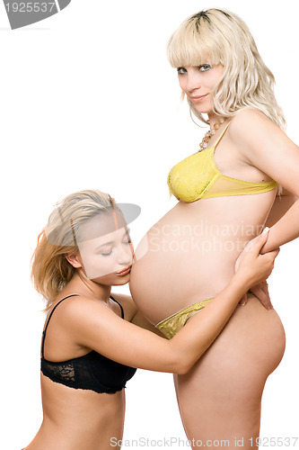 Image of Pregnant blond woman with the girlfriend