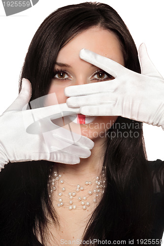 Image of Young beautiful brunette gesturing. Isolated on white