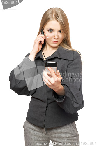 Image of Surprised blonde in a gray business suit