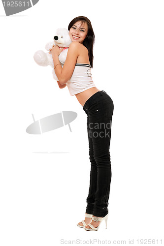 Image of Cheerful beautiful girl with a teddybear