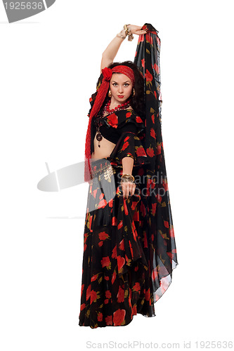 Image of Expressive gypsy woman in a black skirt