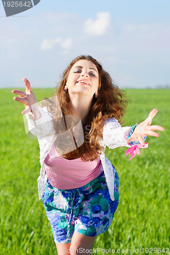 Image of Portrait of cheerful young woman