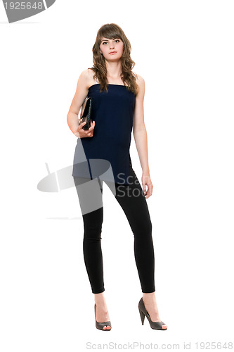 Image of Young beautiful woman in a black leggings. Isolated