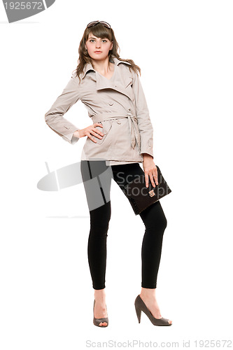 Image of Lovely girl wearing a coat