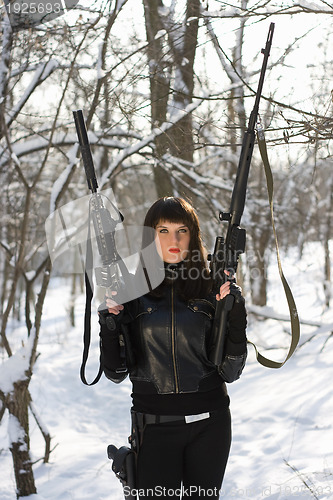 Image of Portrait of a armed beautiful lady 