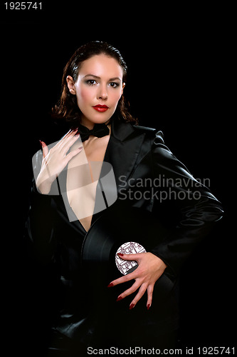 Image of Nice brunette wearing a black suit