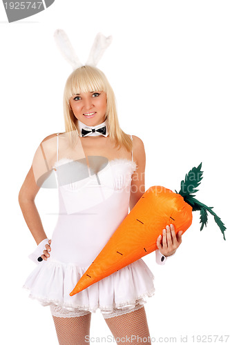 Image of sexy young blonde with a carrot