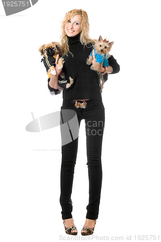 Image of Happy blonde posing with two dogs