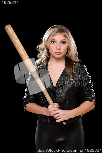 Image of Upset girl with a bat in their hands