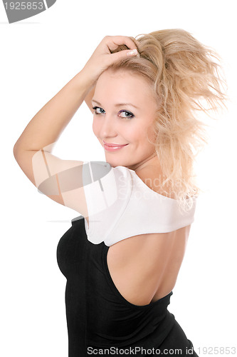 Image of young blonde playing with her hair
