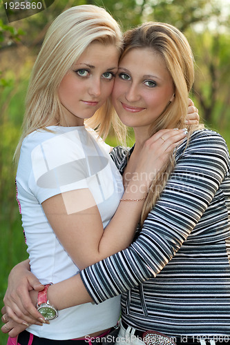 Image of Portrait of two beautiful young blonde