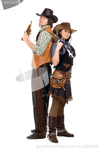 Image of cowboy and cowgirl with a guns