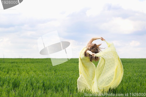 Image of Nice young woman dancing