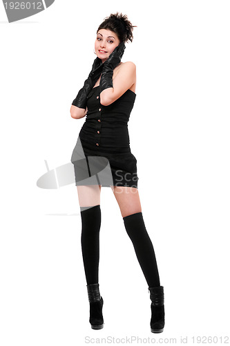 Image of Happy young woman in a black dress