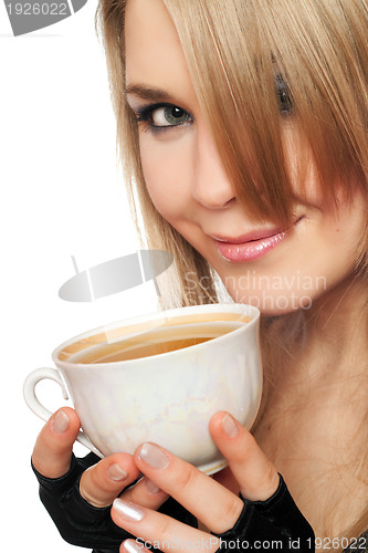 Image of Smiling lovely young blonde with a cup of tea