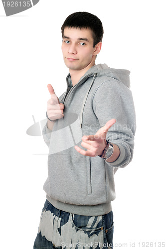 Image of Young man in gray sweatshirt