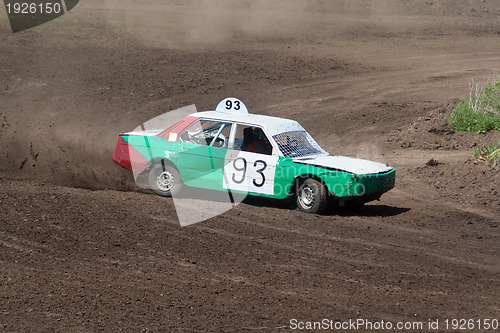 Image of Race for survival. White green car