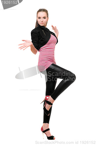 Image of Playful young woman in black leggings