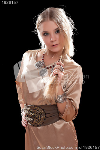 Image of pretty young blonde in a dress