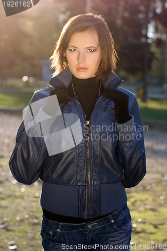 Image of perfect girl in autumn park