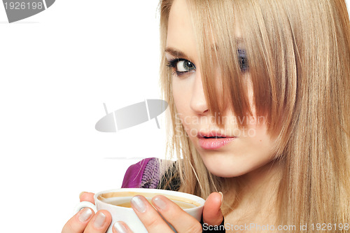 Image of Attractive young blonde with a cup