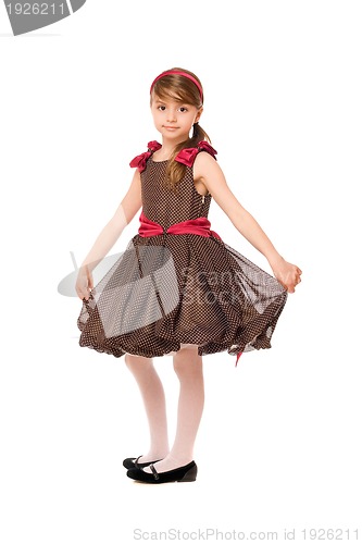 Image of Lovely little lady in a brown dress