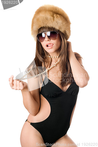 Image of woman in sunglasses showing her tongue