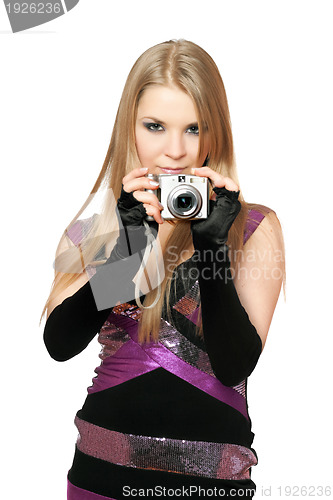 Image of Young beautiful blonde holding a photo camera. Isolated