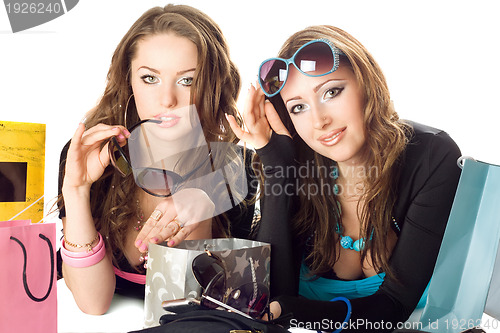 Image of Two beautiful girlfriends in sunglasses
