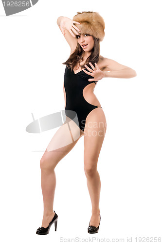 Image of sexy lady posing in swimsuit and fur-cap