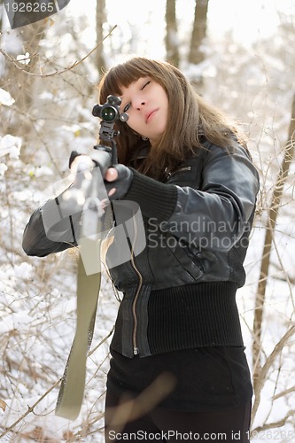 Image of Young lady pointing out