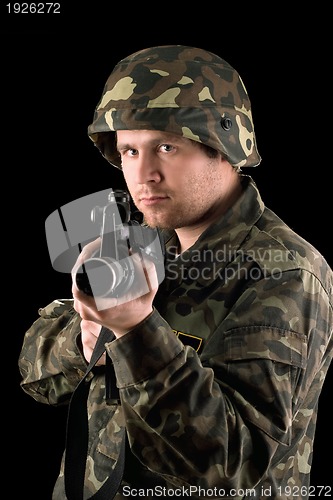 Image of Watchful soldier with m16