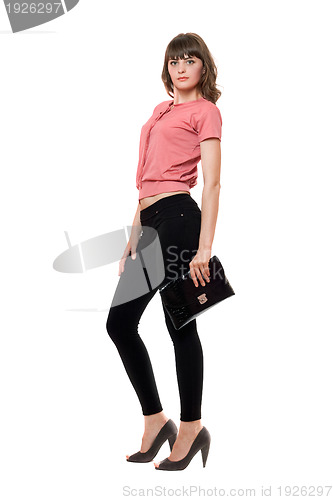 Image of Young woman in a black leggings. Isolated