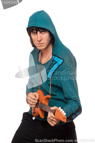 Image of Bizarre man with a little guitar. Isolated