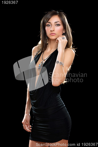 Image of beautiful young brunette in black dress