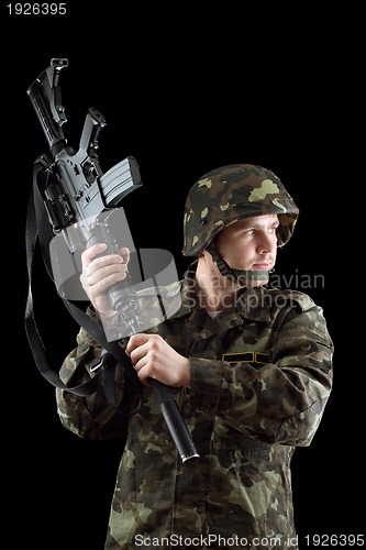 Image of Soldier threatening with a rifle