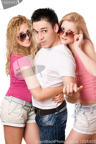 Image of two playful women and handsome young man