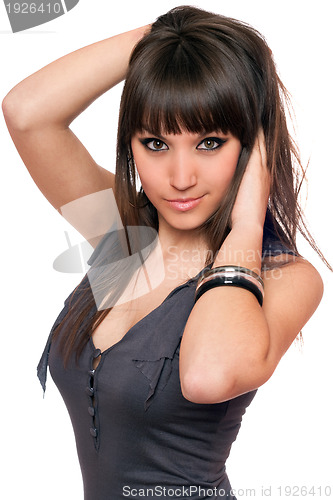 Image of Portrait of pretty brunette in a dress