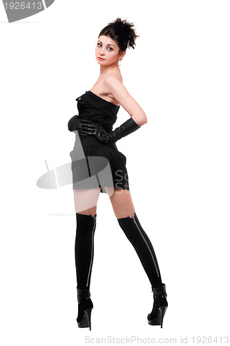 Image of Sexy young woman in a black dress. Isolated
