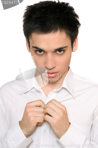 Image of Portrait of handsome young man in a white shirt