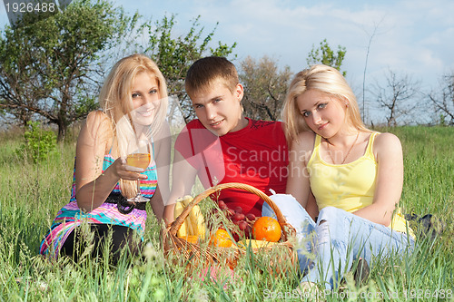 Image of Two attractive blonde and young man
