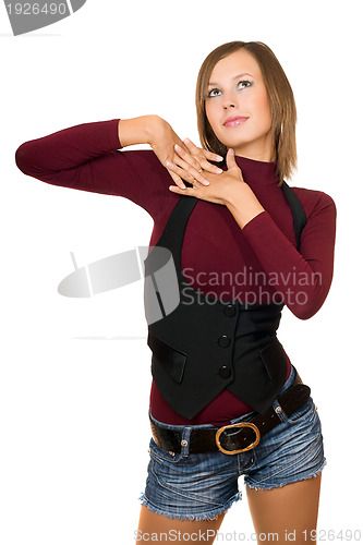 Image of Portrait of dreamy girl in a black vest 