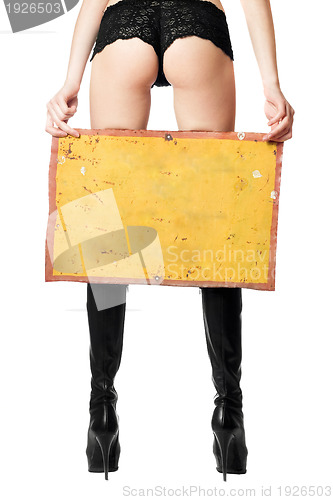 Image of Sexy woman with yellow vintage board
