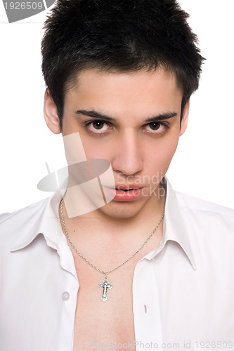 Image of Closeup portrait of young man in a white shirt