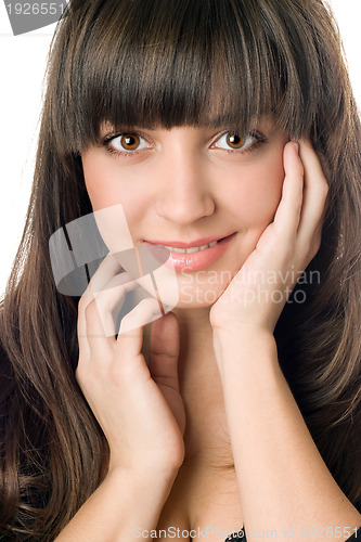 Image of young woman with dark hair and brown eyes