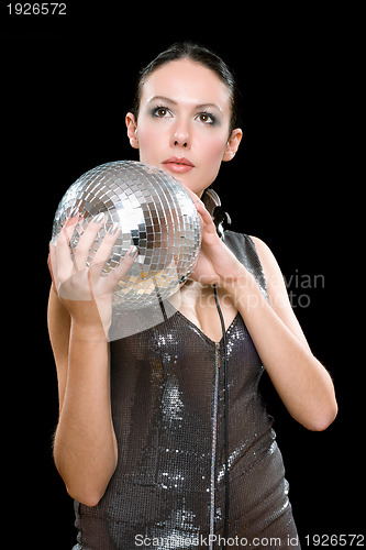 Image of Portrait of young brunette with a mirror ball