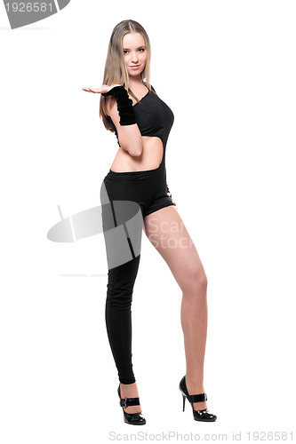 Image of Sexy playful young woman in skintight black costume